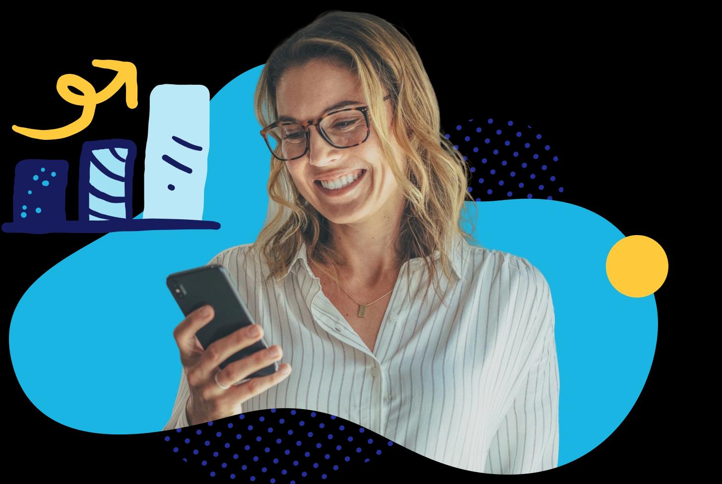 woman smiling looking at a smartphone